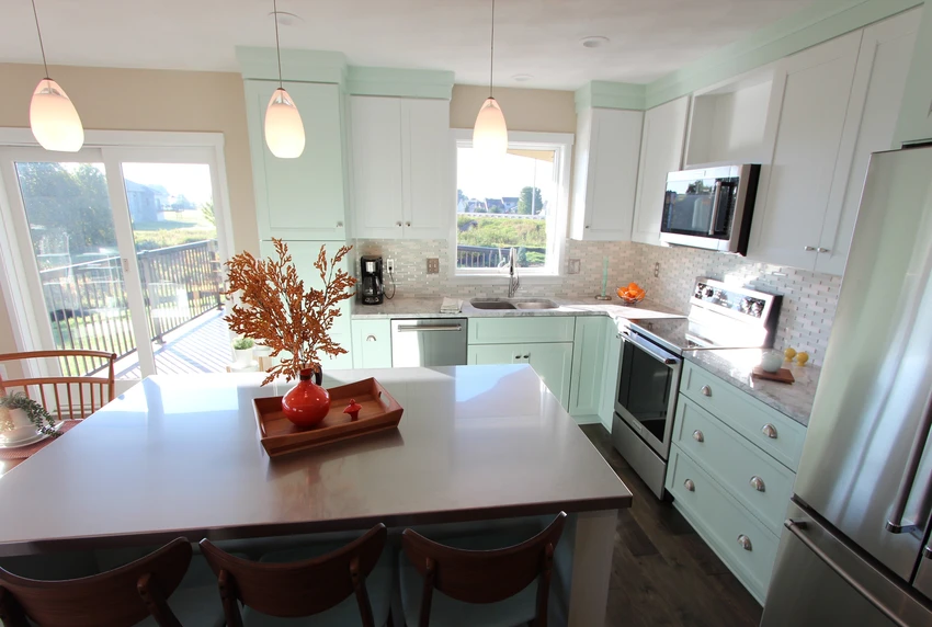 modern kitchen with view of backyard